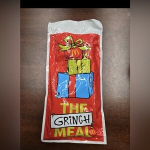 McDonald’s 2025 Grinch Socks, unopened, yellow
